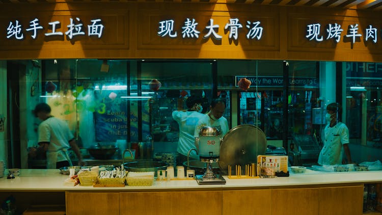 People Working In An Asian Restaurant