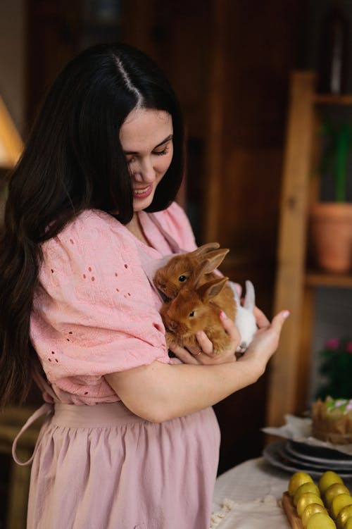 Smiling Woman with Rabbits