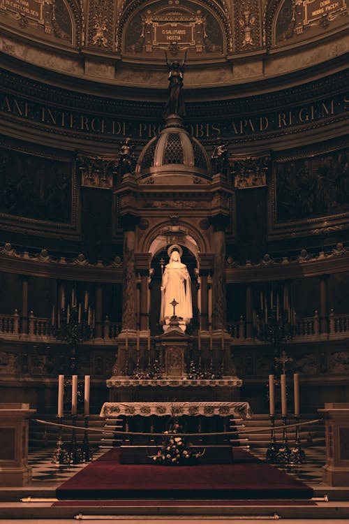 A church with a statue of the virgin Mary