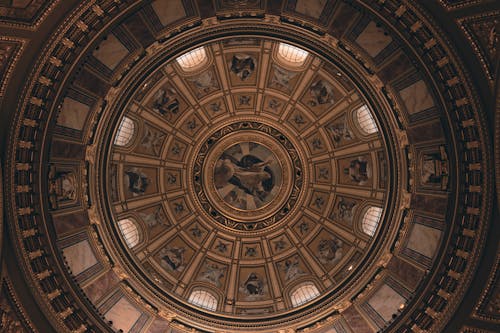 The ceiling of a building with a dome