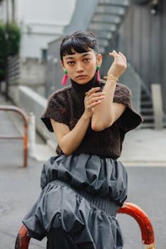 Stylish portrait of an elegant woman posing outdoors in Tokyo, Japan.