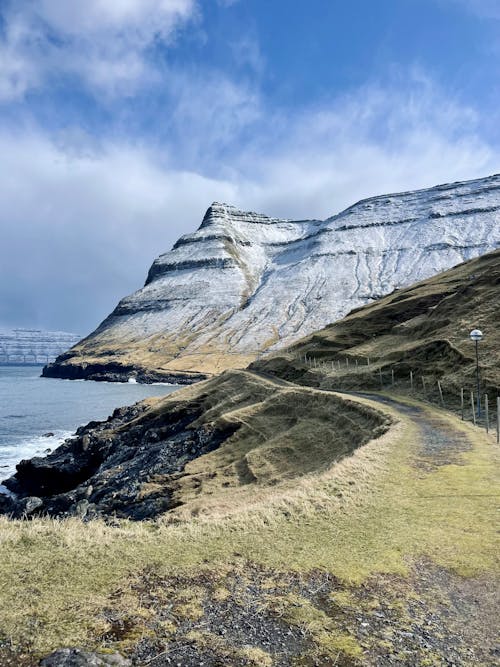 Gratis lagerfoto af bjerg, færøerne, lodret skud