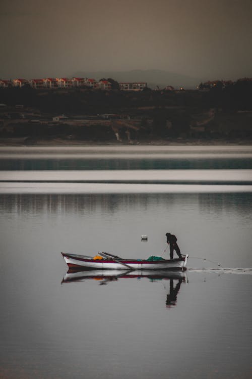 Gratis stockfoto met boot, huizen, iemand