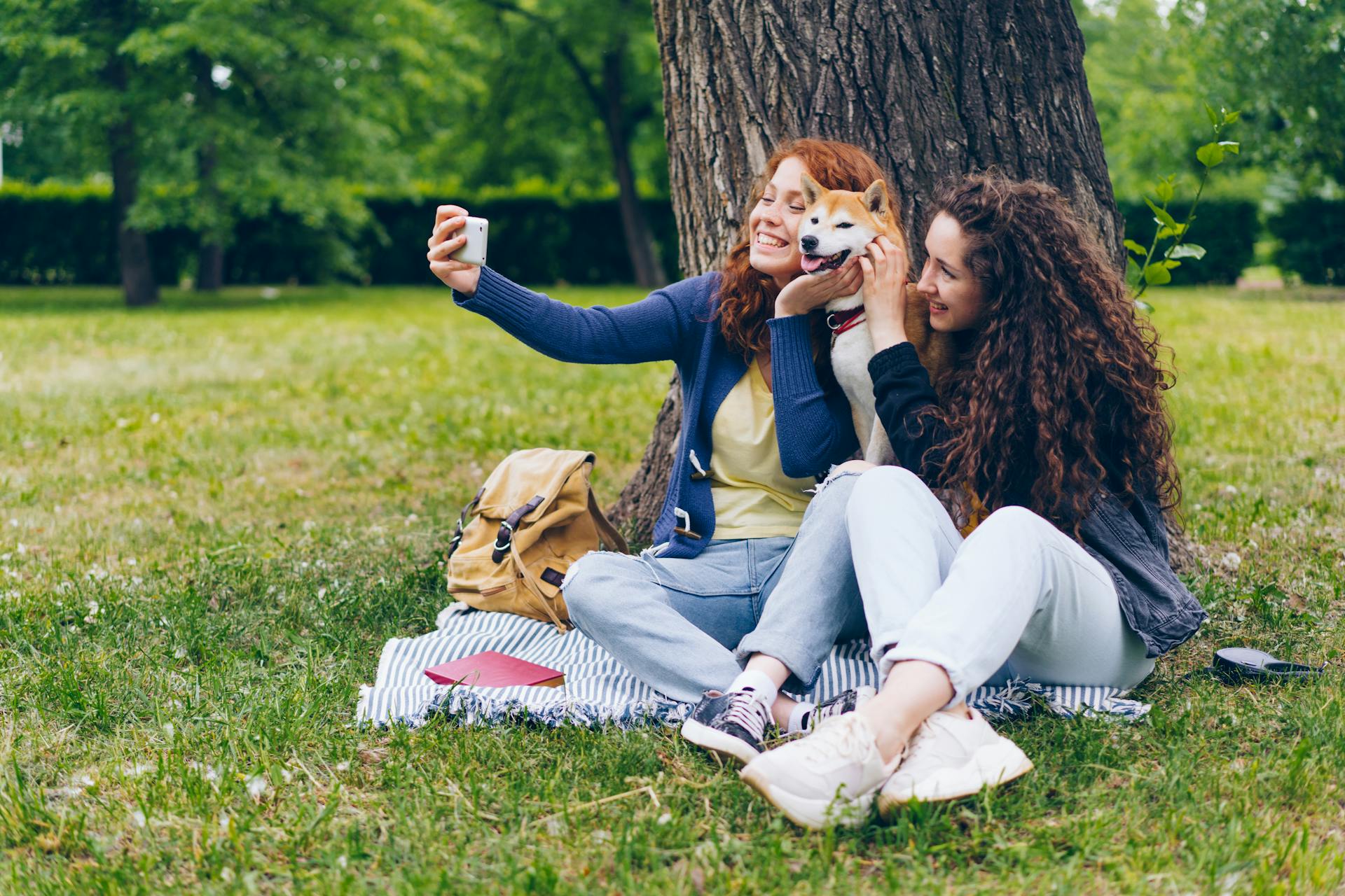 Smiling Women with Dog at Park