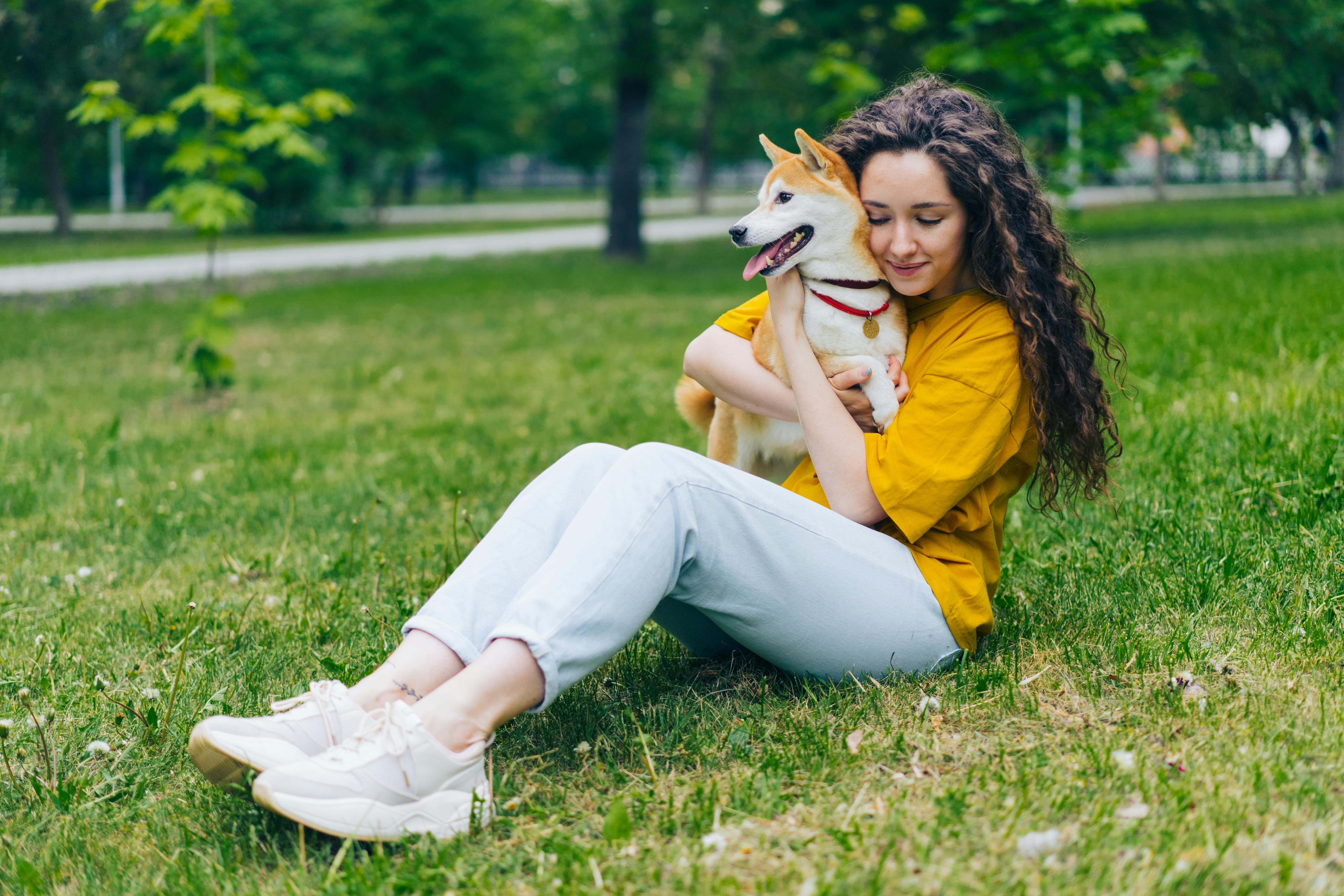 Woman Hugging Shiba Inu 