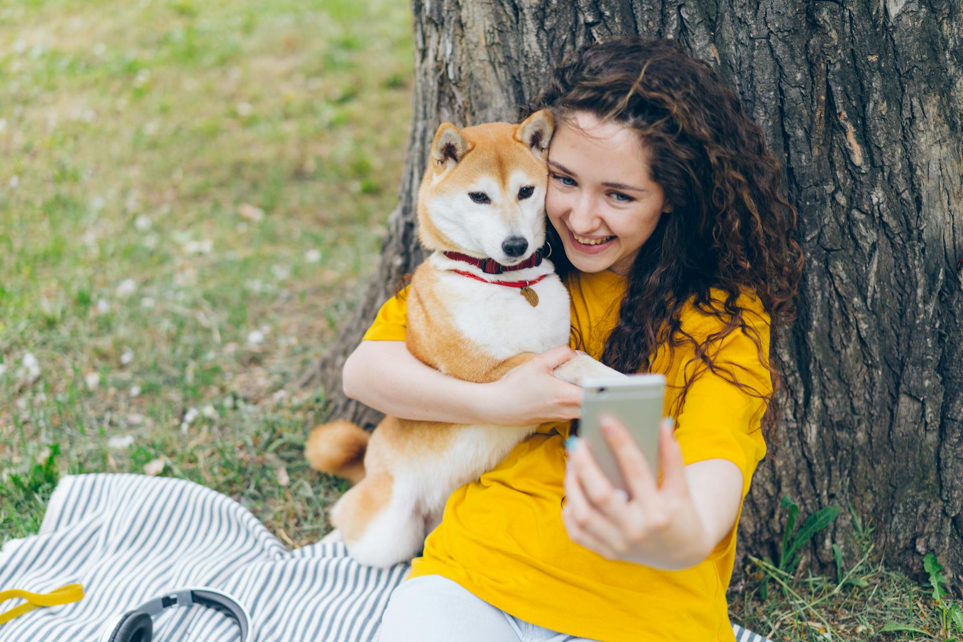 Woman Taking Selfie with Shiba Inu 