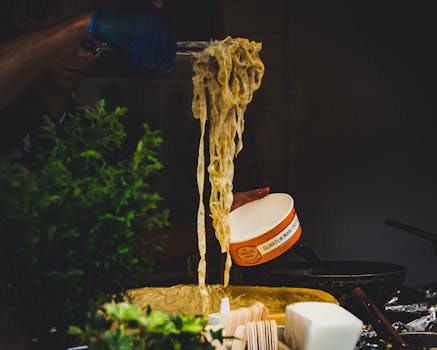 A delicious serving of pasta at a London street food market, showcasing vibrant flavors.