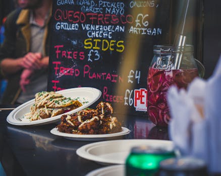 Delicious Venezuelan street food at a vibrant market stall in England.