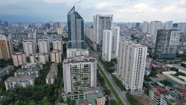 Aerial view of Thanh Xuân district showing modern skyscrapers and urban sprawl in Hà Nội, Vietnam.