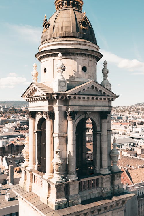 The top of a tower with a clock on it