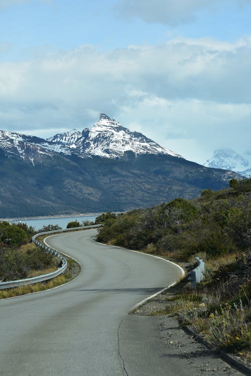 Winding Road Along the River in the Valley