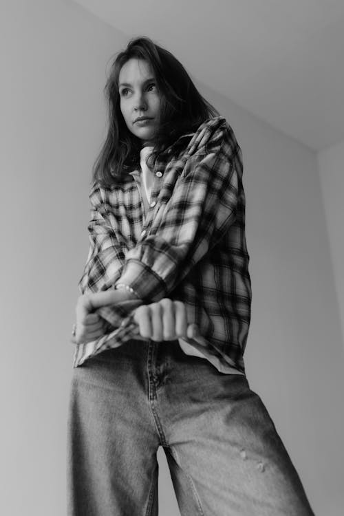Model in a Plaid Blouse and Jeans