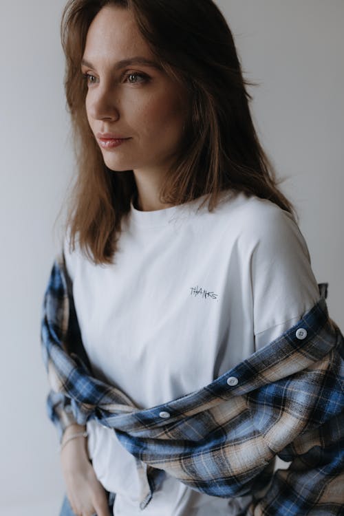 Free Model in a Flannel Shirt Tied Over a White T-shirt with the Thanks Print Stock Photo