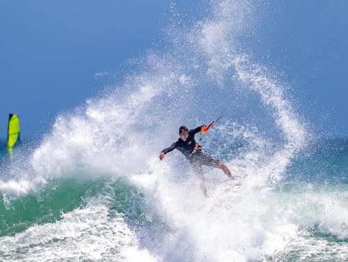 Man Water Skiing during Day