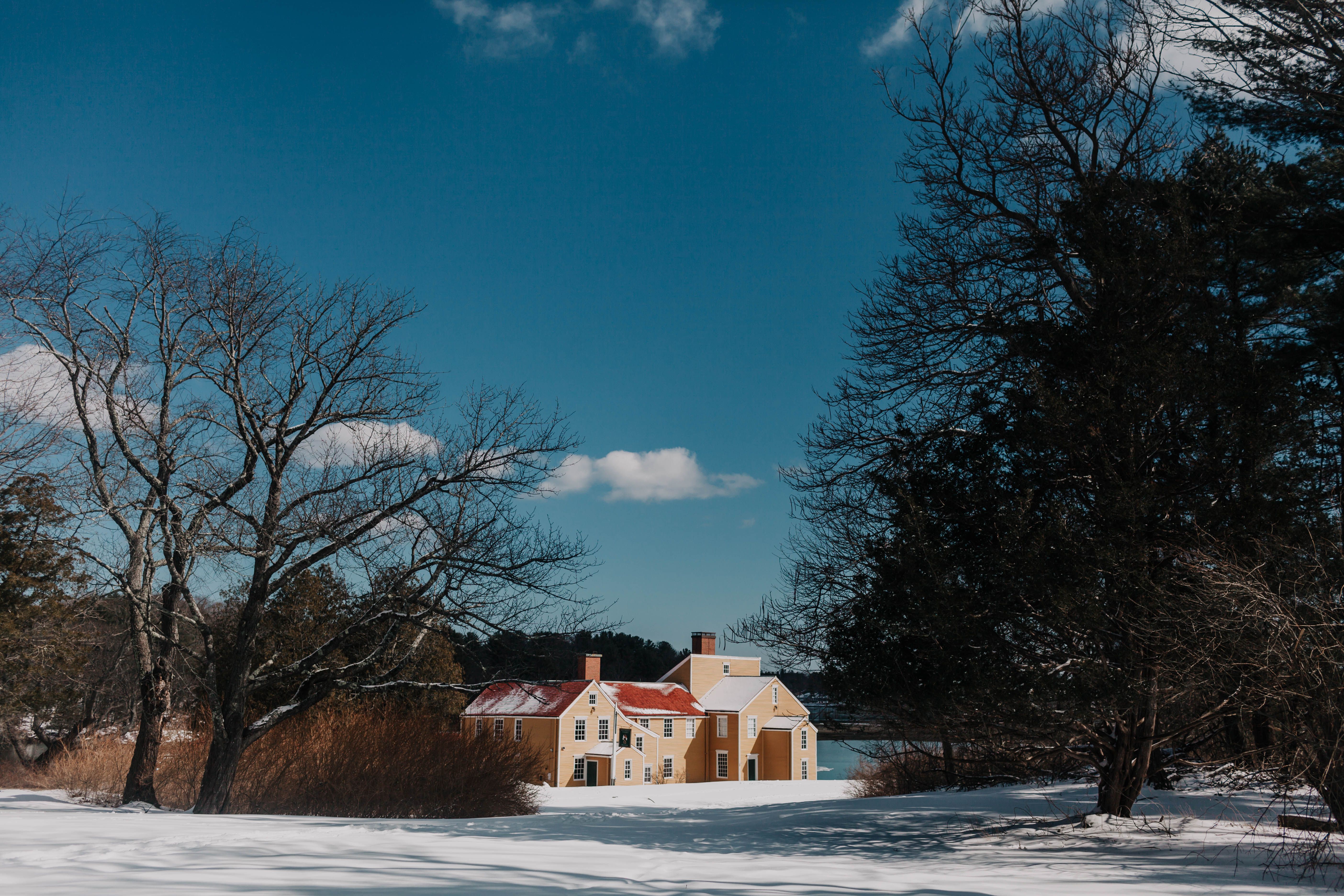 Landscape Photography of House Under Calm Blue Sky · Free Stock Photo
