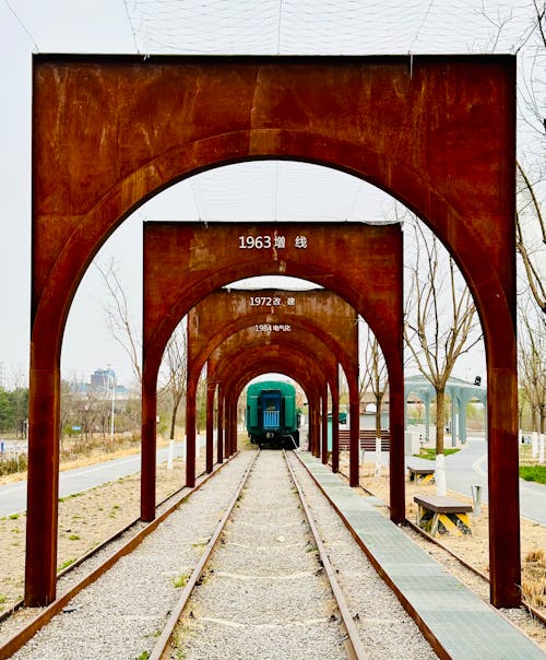 Old Rusty Arches over Railway Tracks