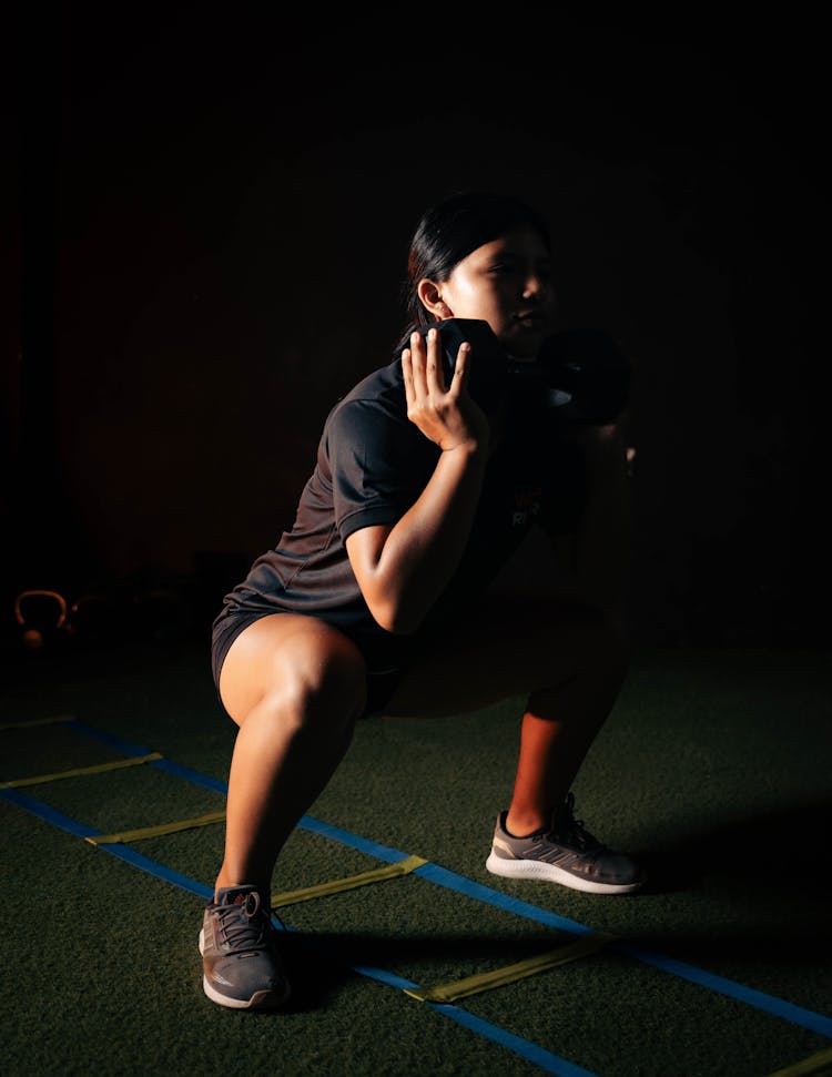 Woman During Training In Gym