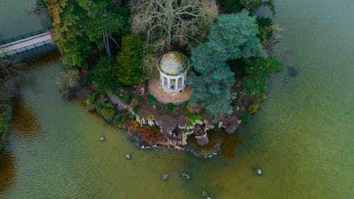 Aerial view of a small island in the middle of a lake