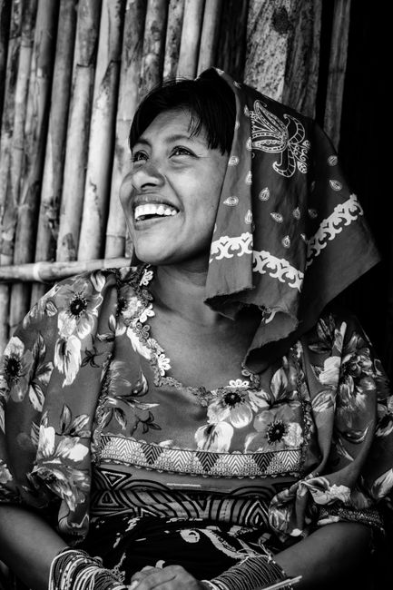 Portrait of a happy Guna Yala woman in traditional clothing in Pategán, Panama.