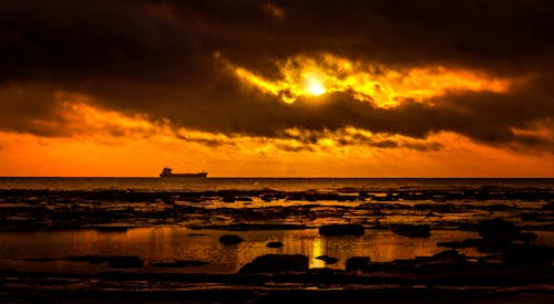 Безкоштовне стокове фото на тему «березі моря, Захід сонця, краєвид»