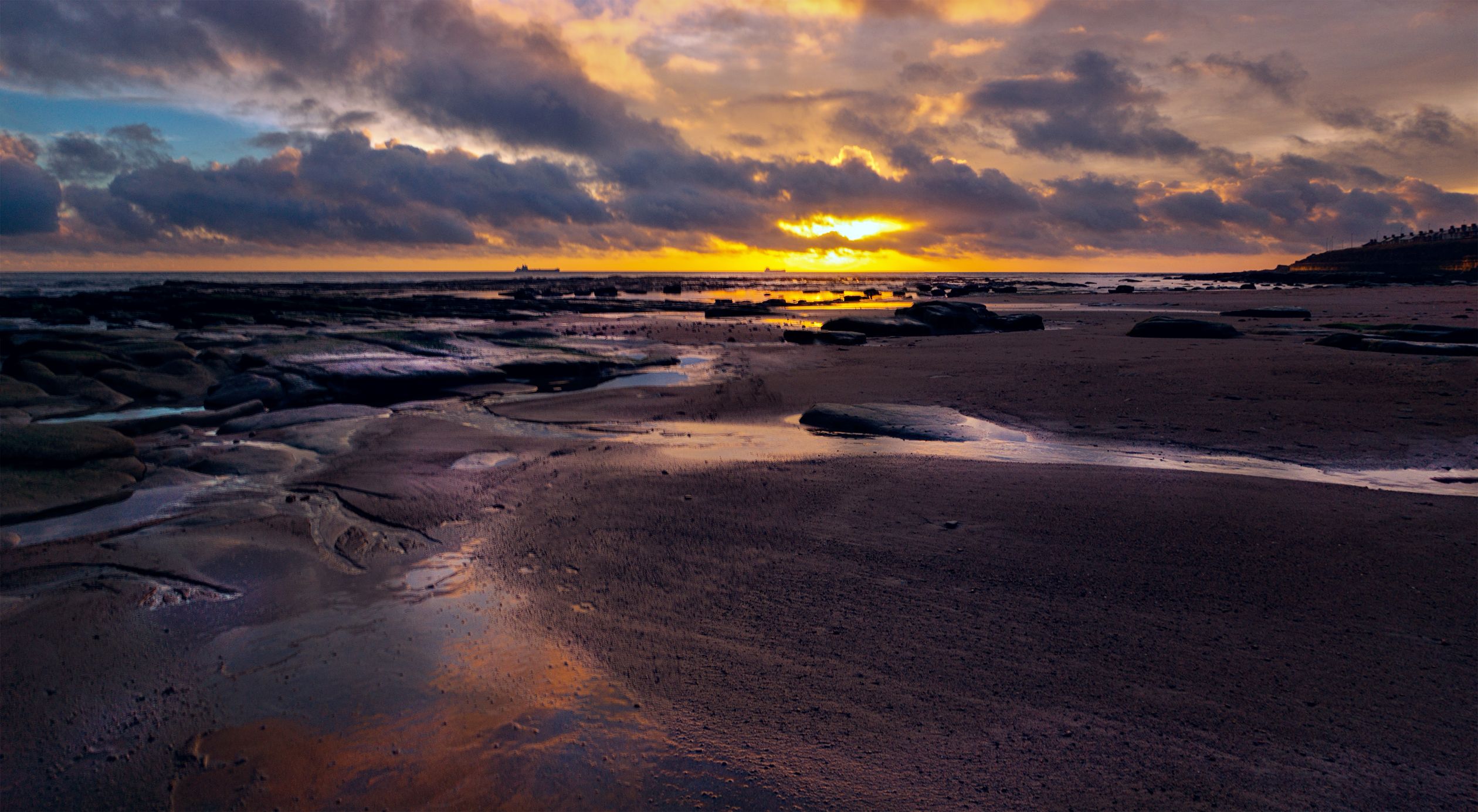 Clouds over Sea Shore at Sunset · Free Stock Photo