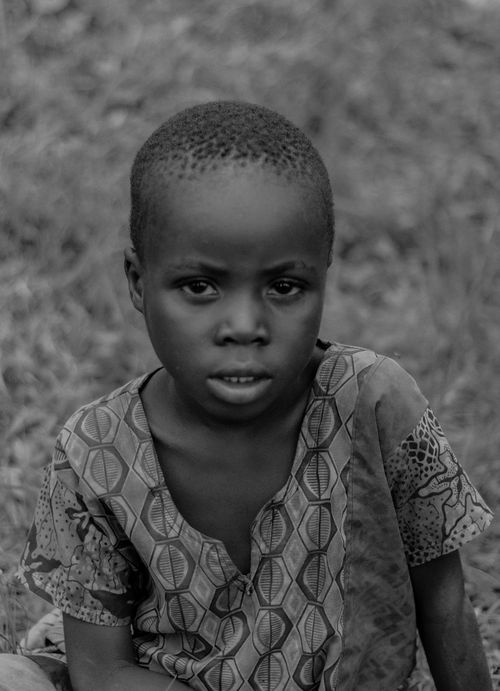 Free Black and white portrait of a child in traditional clothing, Bujumbura, Burundi. Stock Photo