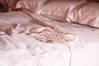 White Corset on Bed