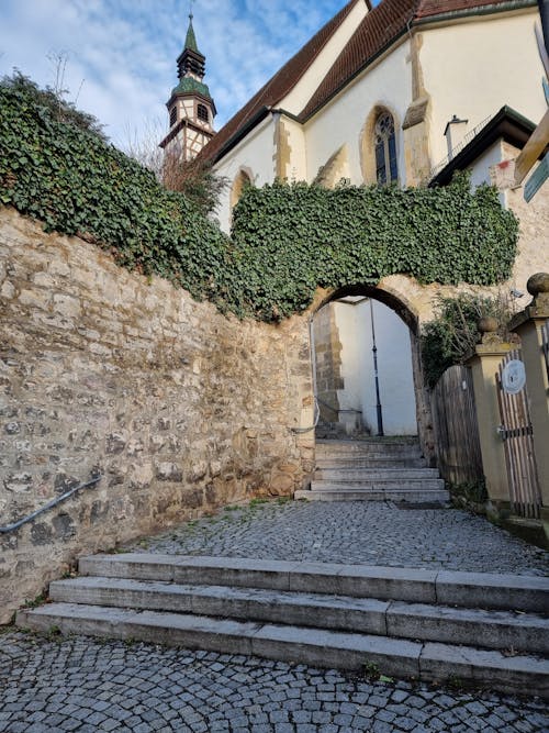 A stone staircase leading up to a church
