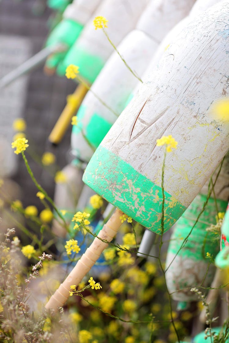 Shabby Concrete Cone Shaped Vessels In Garden