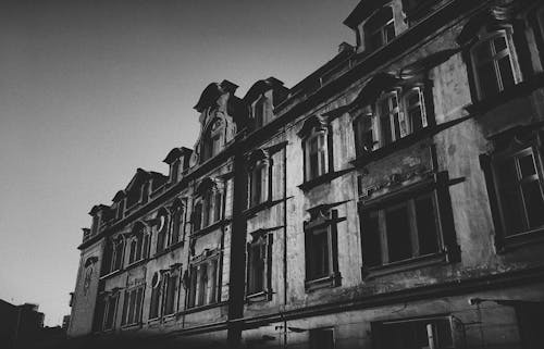 Grayscale Photo of Gray and Brown Building