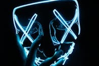Person Wearing Lighted Blue Led Mask