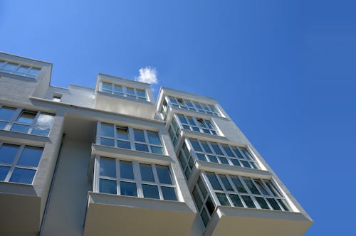 Free Worm's Eye-view Photography of White Concrete Building Stock Photo