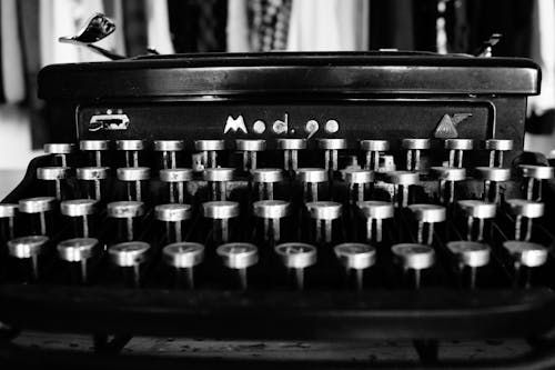 Gray Scale Photography of Typewriter