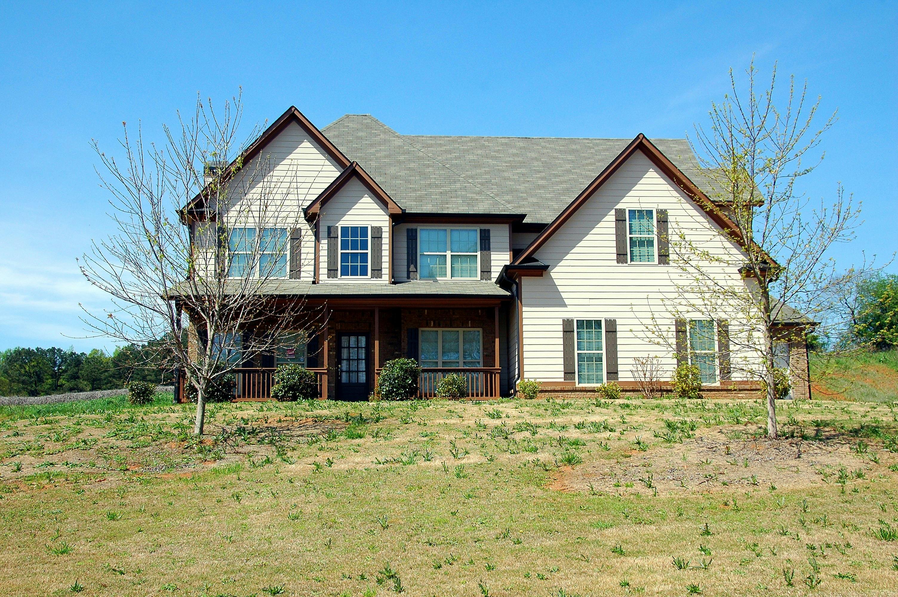 white and brown painted house