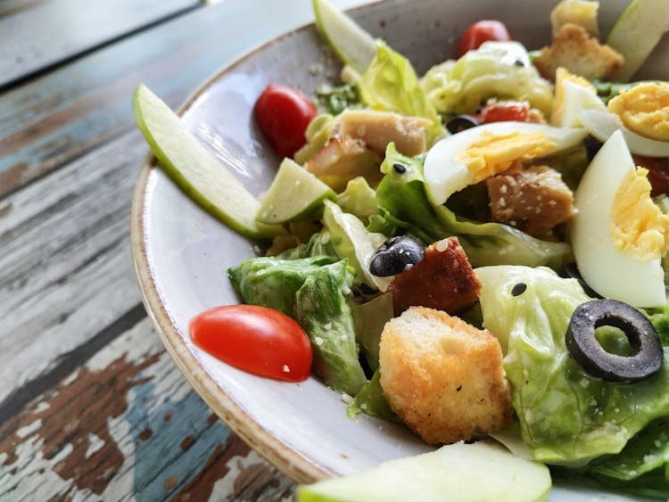 Close-Up Photo Of Vegetable Salad With Boiled Egg