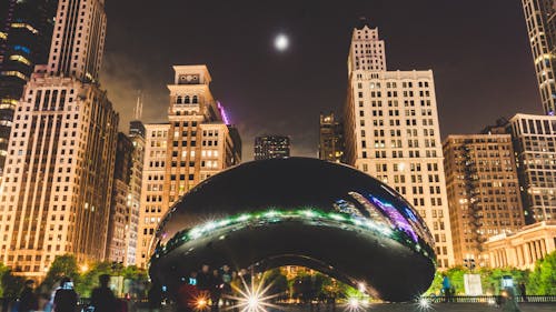 Free Cloud Gate in Front of High-rise Tower Buildings Stock Photo