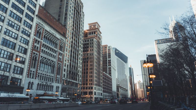 Downtown financial district skyline at dusk — photo by Chait Goli on Pexels