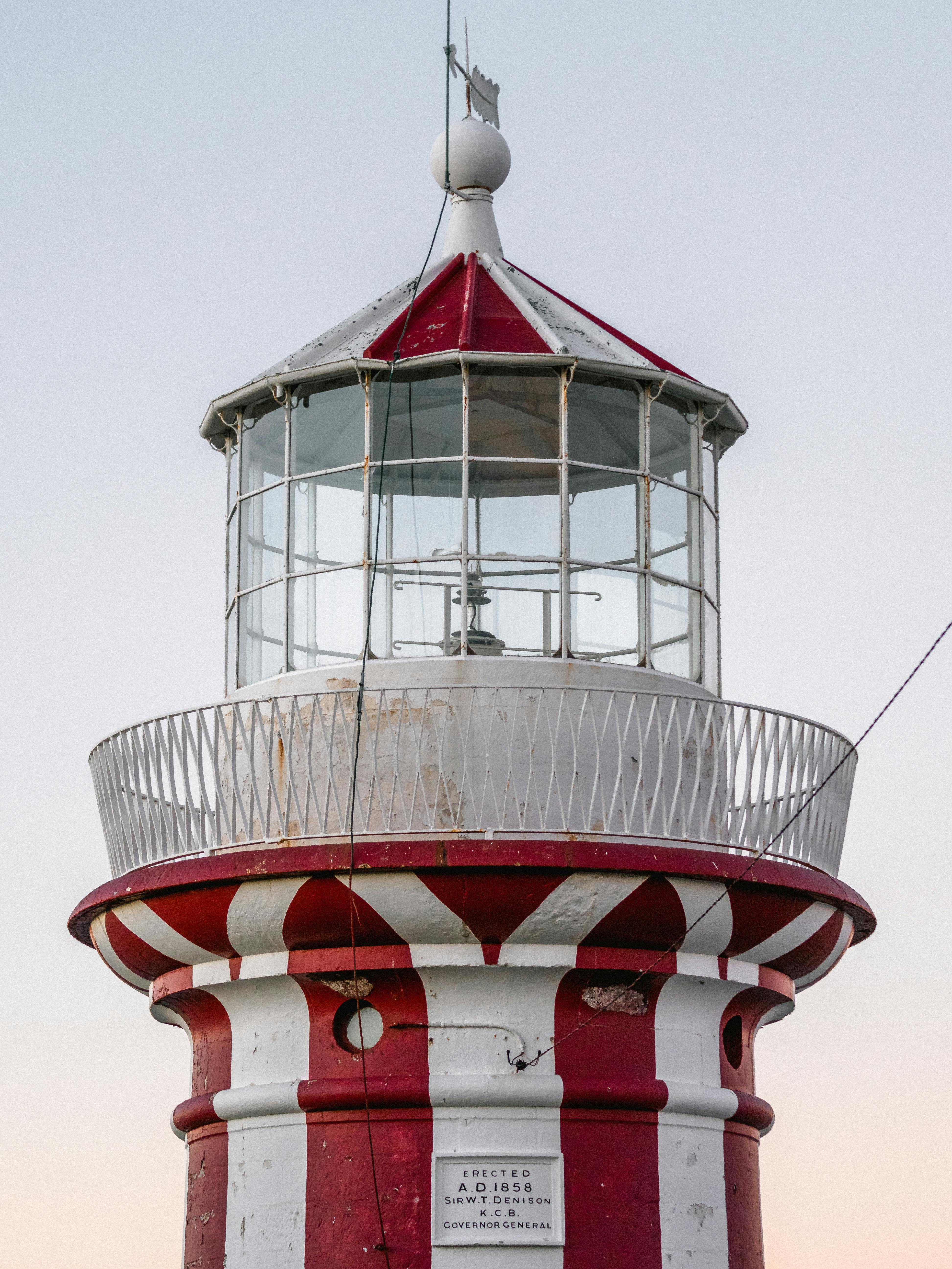 White And Red Lighthouse · Free Stock Photo