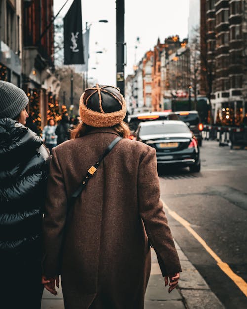 Two people walking down the street with the words, how to make a great first impression