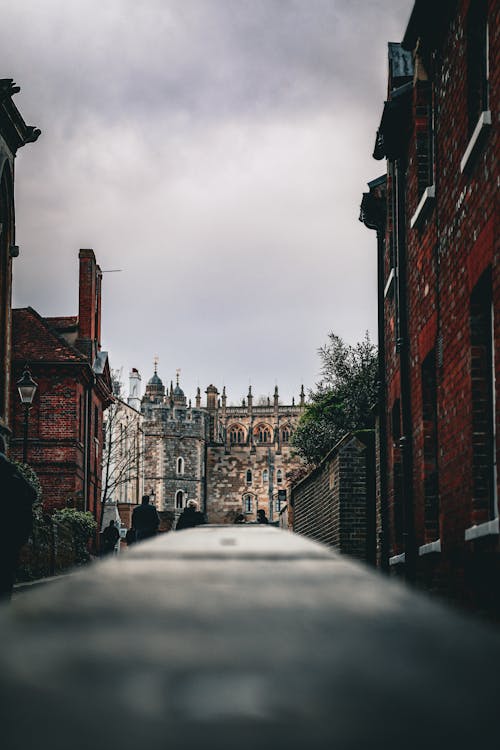 A view of a city street with a tall building