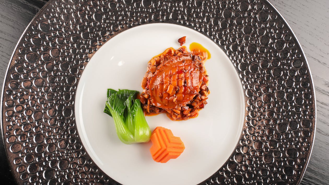 Meal with Meat, Bok Choy and Carrot on Plate