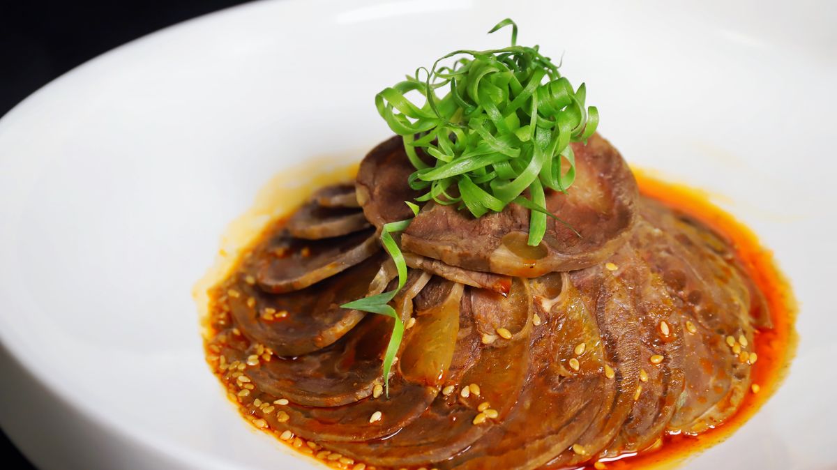 Sliced beef tongue in rich sauce — gyutan, Sendai's signature dish invented in 1948, now served at more than 100 specialist restaurants in the city