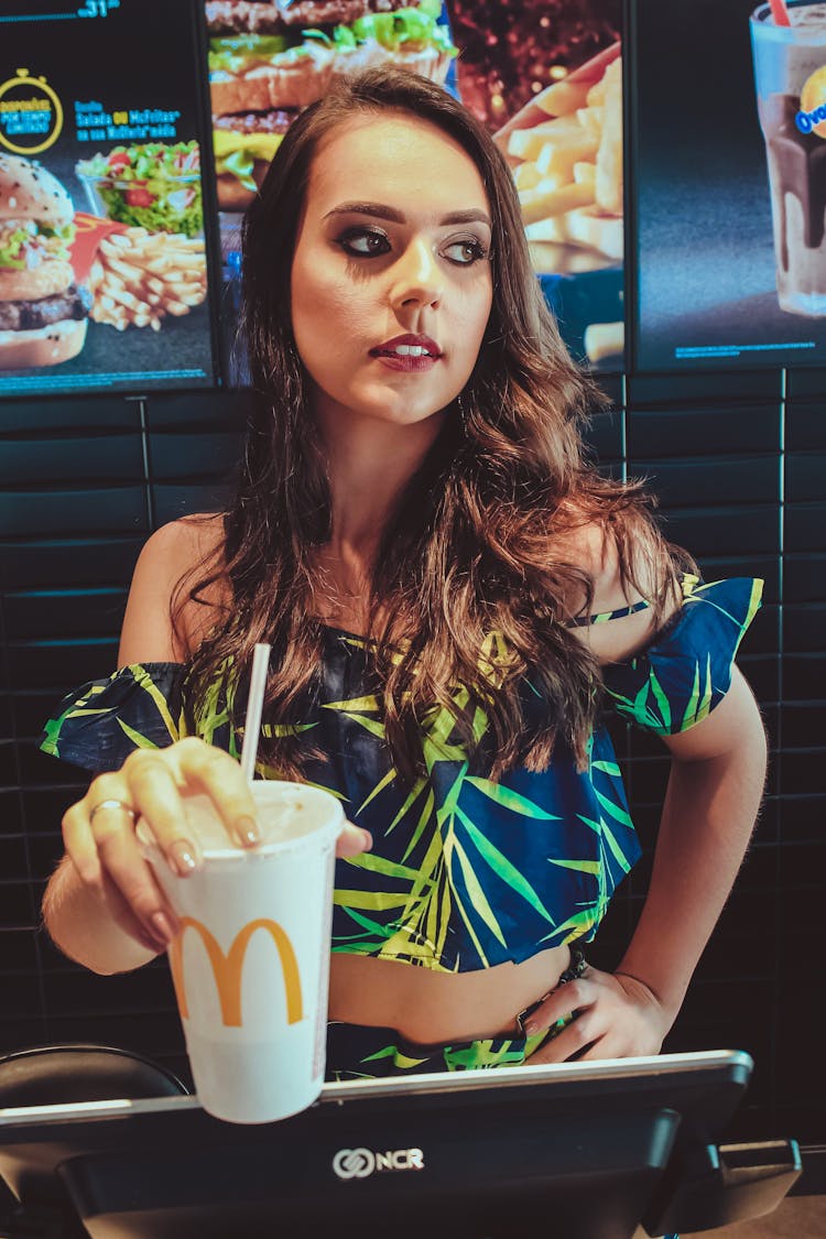 Woman Holding Mcdonald Soda Cup