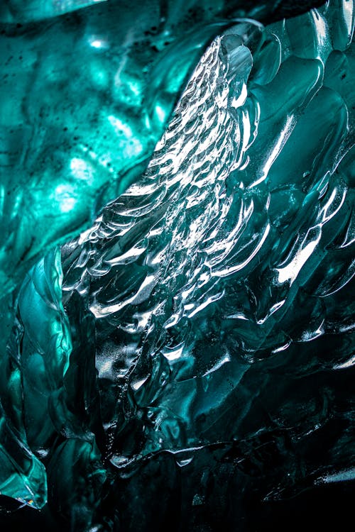 A close up of a blue ice cave