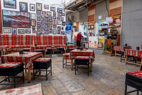 Free Discover a quaint Turkish café in İzmir, adorned with vibrant traditional patterns and local art. Stock Photo