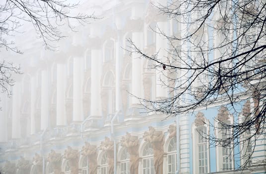 Serene snapshot of Catherine Palace facade enveloped in fog at Tsarskoye Selo, Russia.