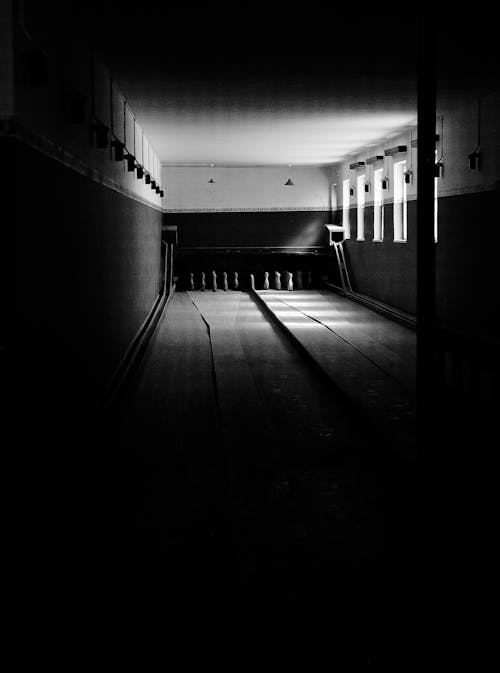 Grayscale Photography of Bowling Alley