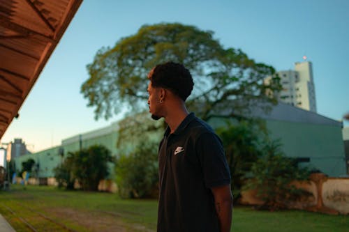 A man standing in front of a building