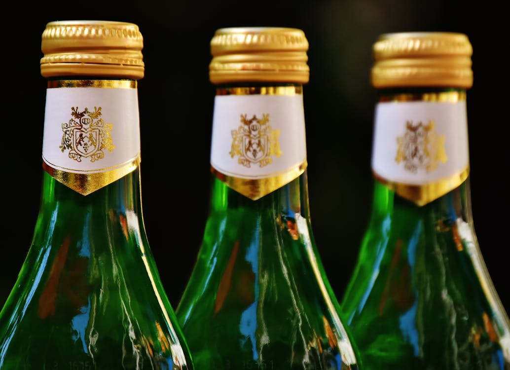 Free Three Green Glass Bottles Stock Photo