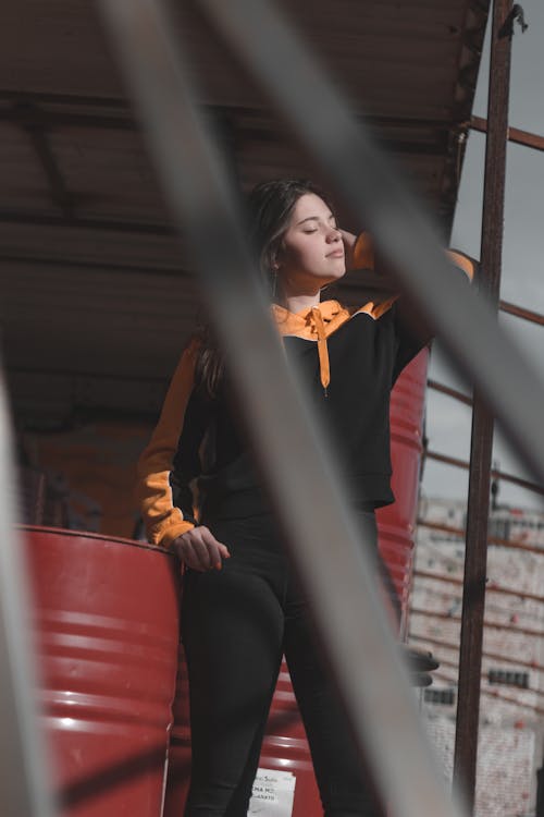 Free Woman Wearing Black and Orange Jacket Stock Photo